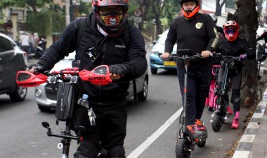 Dampak Naiknya BBM Bersubsidi, Salah Satu Karyawan BUMN di Pekanbaru Beralih Menggunakan Sekuter Matic  untuk berangkat kerja