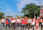Hari Jadi Desa Simpang Beringin, Bupati Pelelawan Ikuti Gerak Jalan Santai Dan Senam Sehat Bersama Masyarakat