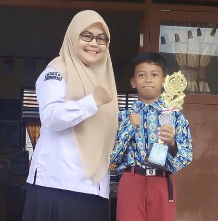 SDN 017 Sungai Guntung Raih Juara 3 Pencak Silat, Syahmi Adi Nugraha Harumkan Nama Sekolah Di Ajang O2SN Rengat