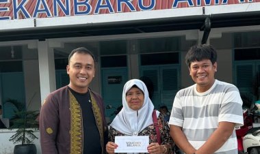 Laporkan Tumpukan Sampah, Warga Tenayan Raya Dapat Voucher Belanja dari DLHK Pekanbaru